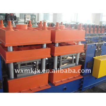 Speedway guard rail forming machine